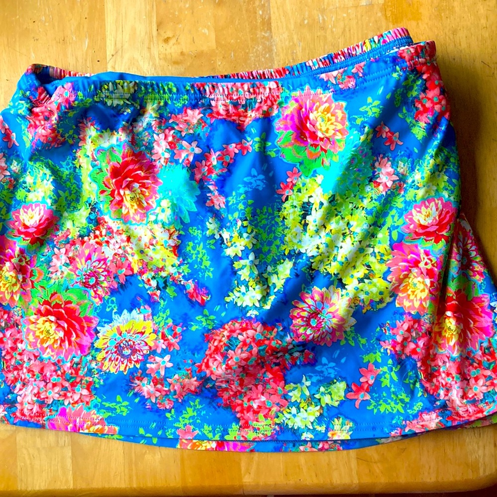 Swim skirt with hidden bikini bottom